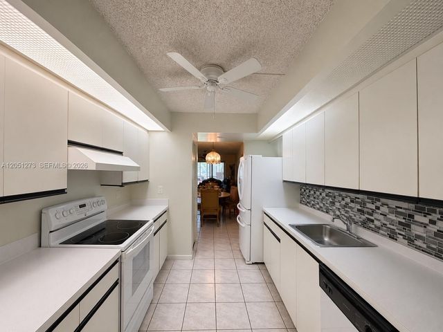 12950 SW 4th Ct 209H, Pembroke Pines, FL 33027