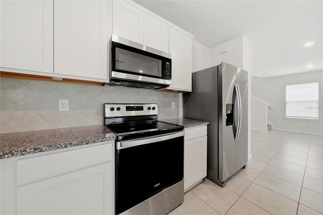 9469 RALLY SPRING LOOP, Wesley Chapel, FL 33545