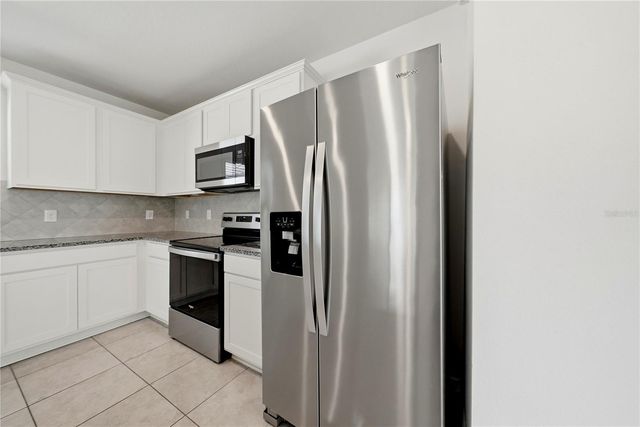9469 RALLY SPRING LOOP, Wesley Chapel, FL 33545