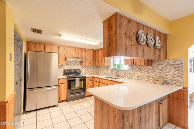 1820 Pine Tree Drive, Edgewater, FL 32132