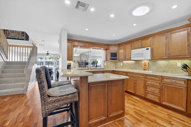 1029 Boca Cove Lane, Highland Beach, FL 33487