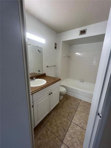 12730 VISTA ISLES Drive 812, Sunrise, FL 33325
