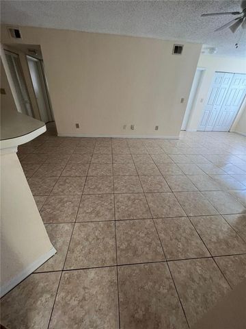 12730 VISTA ISLES Drive 812, Sunrise, FL 33325