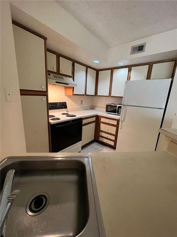 12730 VISTA ISLES Drive 812, Sunrise, FL 33325