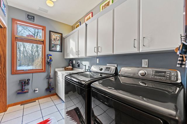 9208 SHERINGHAM Drive, Roscoe, IL 61073