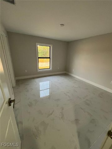 241 Narthex AVE S, Lehigh Acres, FL 33974