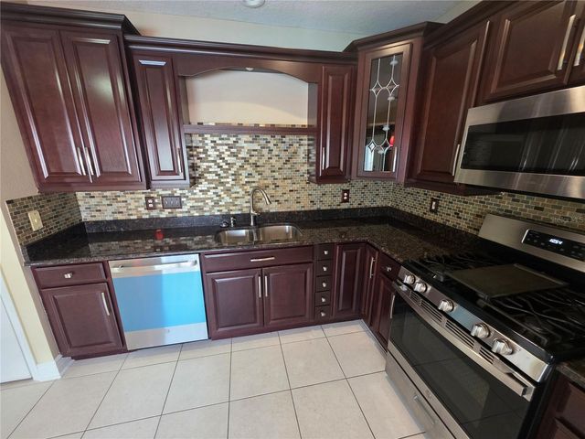 1690 MEADOW OAK LANE, Tarpon Springs, FL 34689