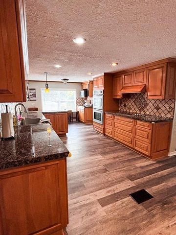 12601 DOUBLE RUN RD, Astatula, FL 34705