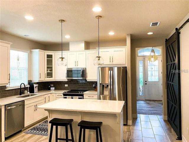 7902 CORKFIELD AVENUE, Orlando, FL 32832
