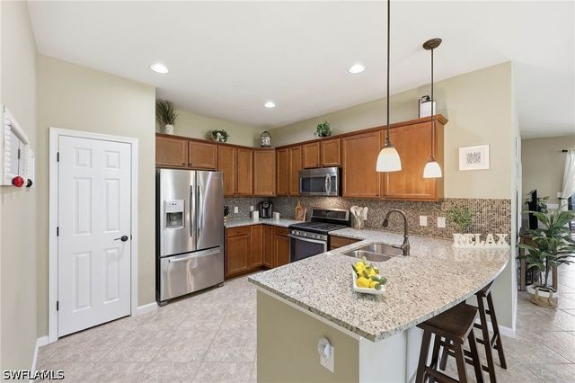 7156 Live Oak DR, Naples, FL 34114