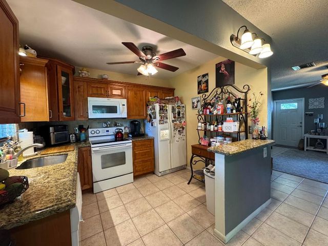 2615 SW Natura Avenue, Deerfield Beach, FL 33441
