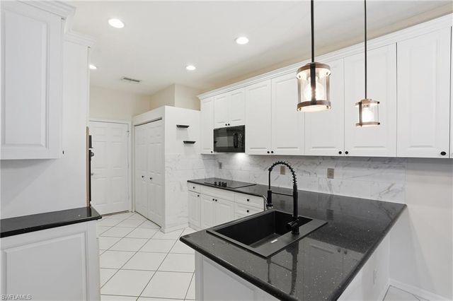 7432 Berkshire Pines DR, Naples, FL 34104