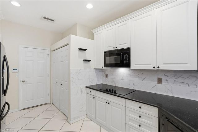 7432 Berkshire Pines DR, Naples, FL 34104