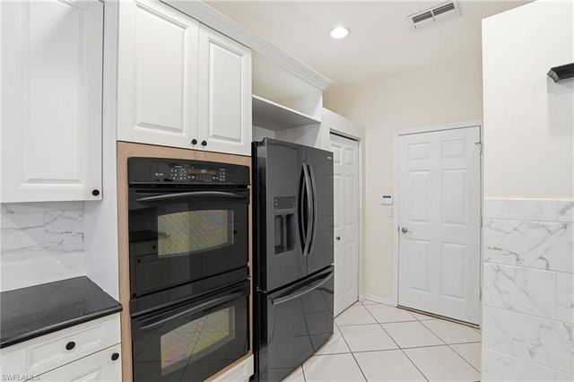 7432 Berkshire Pines DR, Naples, FL 34104