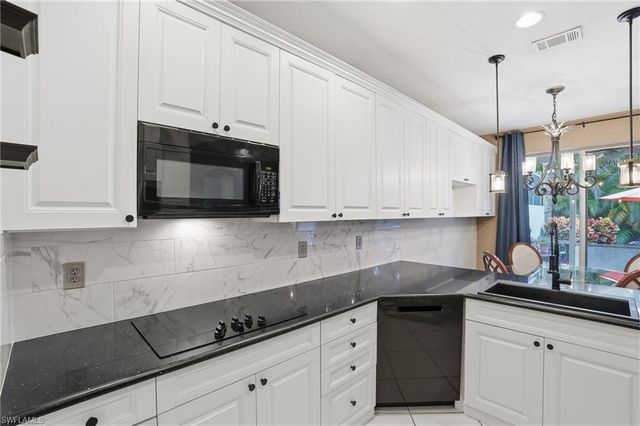 7432 Berkshire Pines DR, Naples, FL 34104