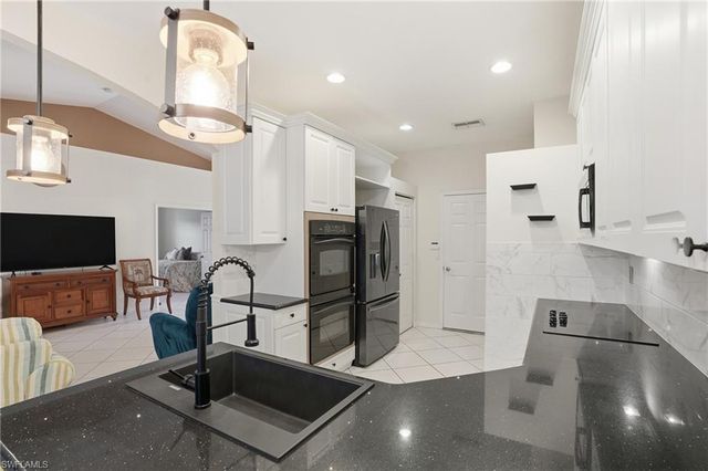 7432 Berkshire Pines DR, Naples, FL 34104