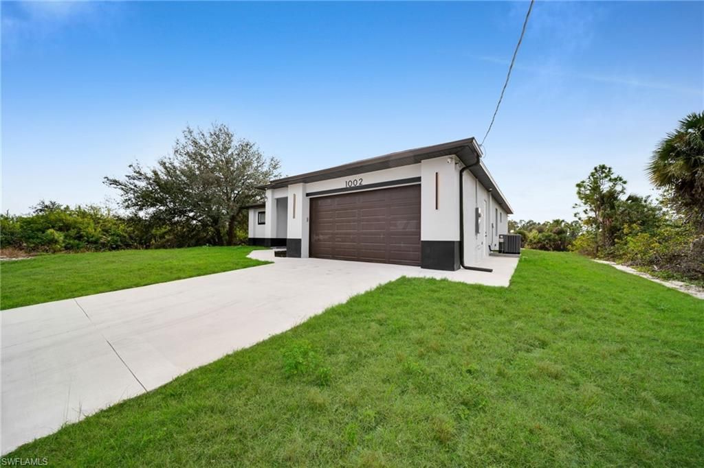 1002 Kanuga ST E, LEHIGH ACRES, FL 33974 — photo 2
