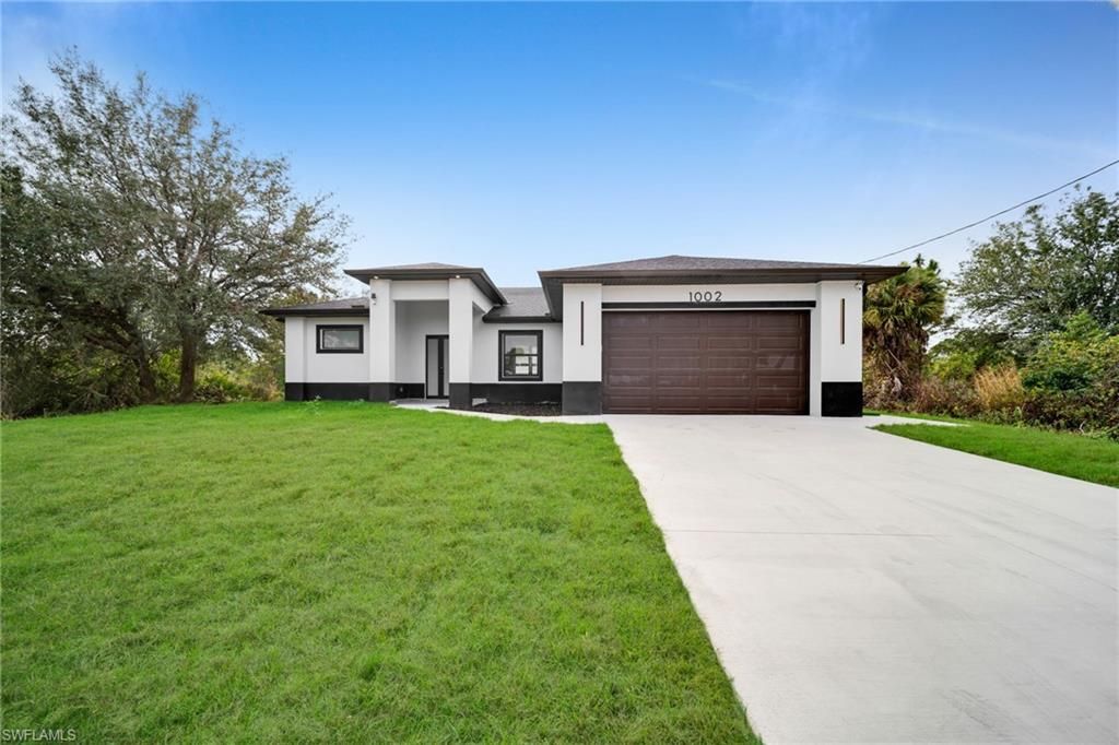 1002 Kanuga ST E, LEHIGH ACRES, FL 33974 — photo 4