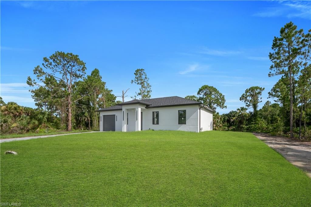 3303 53rd ST W, LEHIGH ACRES, FL 33971 — photo 4