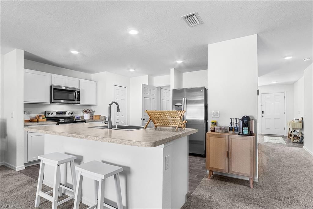 Image 4 of property listing at 1618 7th AVE, Cape Coral, FL 33993