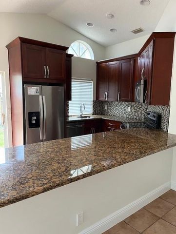 1311 Seagrape Circle, Weston, FL 33326