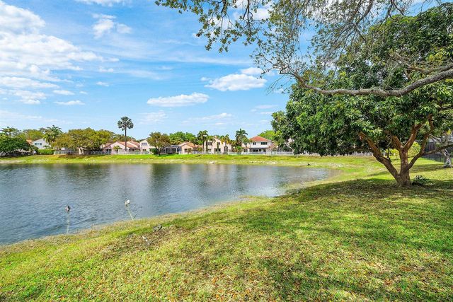 7505 NW 65th Lane, Parkland, FL 33067