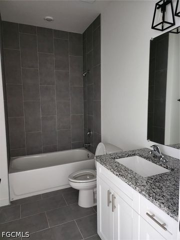 2431 Lola AVE S, Lehigh Acres, FL 33973