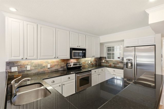 9486 Timberleaf Drive, Dallas, TX 75243