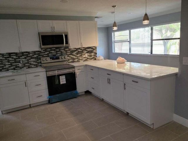 4010 N SHORE Drive, West Palm Beach, FL 33407