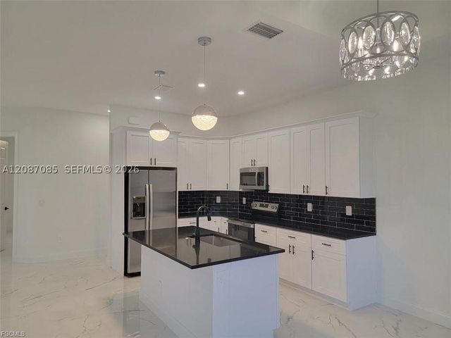 3415 E 36 ST SW, Lehigh Acres, FL 33976