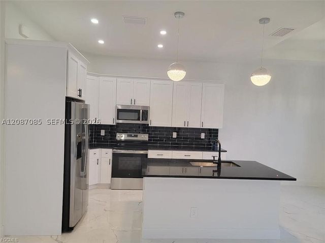 3415 E 36 ST SW, Lehigh Acres, FL 33976