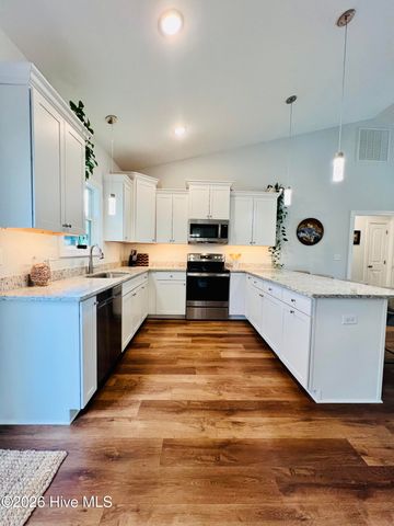 126 NW 18th Street, Oak Island, NC 28465