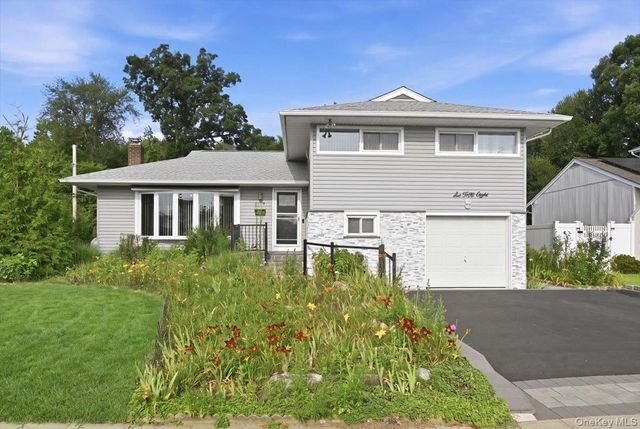 658 Richmond Road, East Meadow, NY 11554