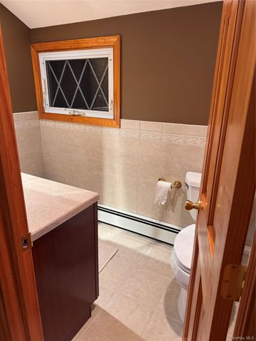 14 King Arthurs Court King Arthurs Court E 14, Saint James, NY 11780