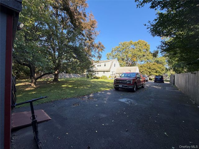 14 King Arthurs Court King Arthurs Court E 14, Saint James, NY 11780