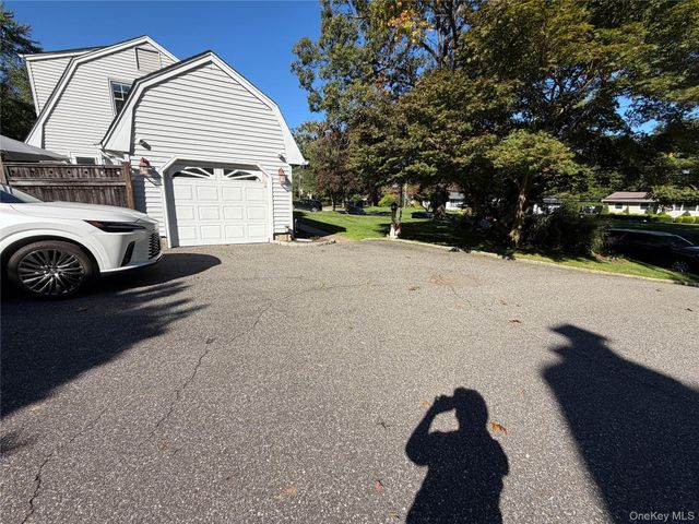 14 King Arthurs Court King Arthurs Court E 14, Saint James, NY 11780