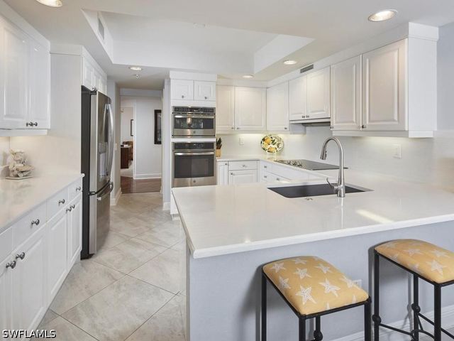 7225 Pelican Bay BLVD 203, Naples, FL 34108