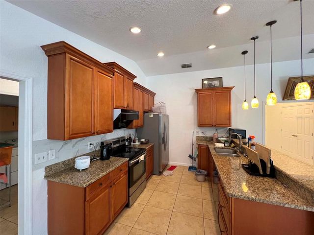 8936 ROSE HILL DRIVE, Orlando, FL 32818