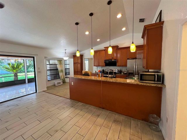 8936 ROSE HILL DRIVE, Orlando, FL 32818