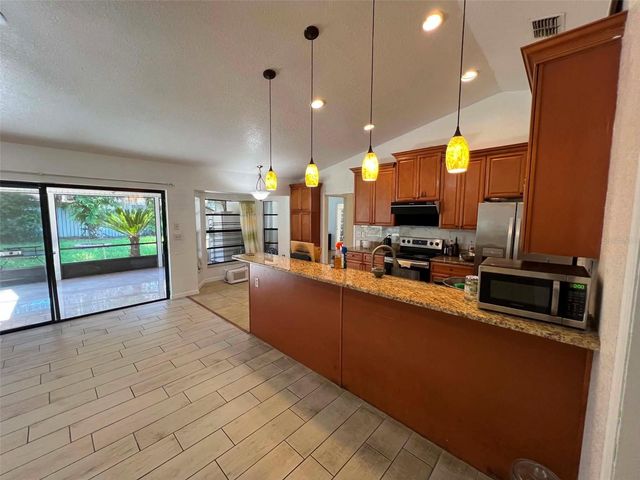 8936 ROSE HILL DRIVE, Orlando, FL 32818