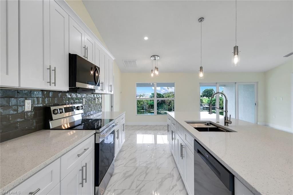 2622 NE 1st PL, CAPE CORAL, FL 33909 — exterior