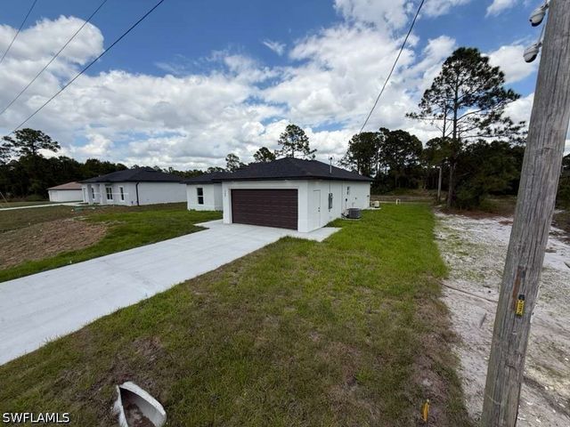 765 Puccini AVE S, Lehigh Acres, FL 33974