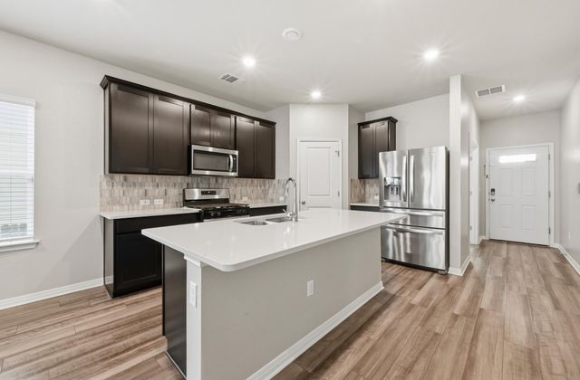 12606 Dairywork RD, Buda, TX 78610