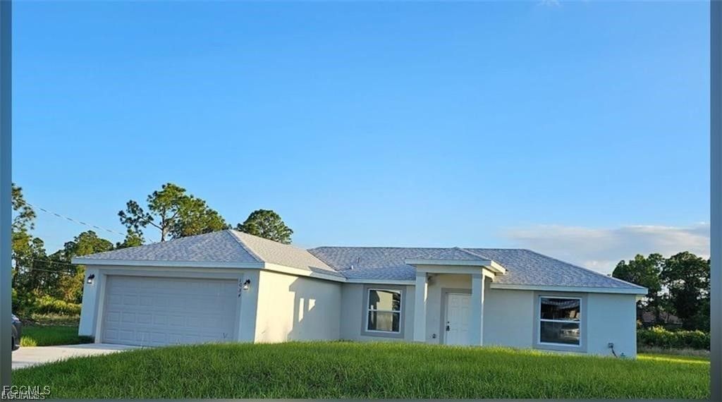 917 Martha AVE S, Lehigh Acres, FL 33974