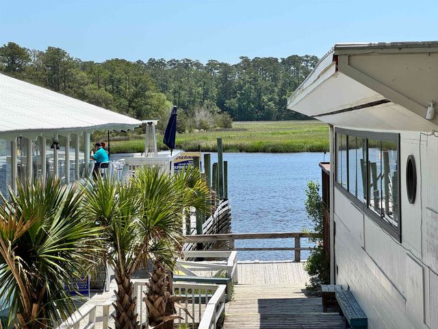 1673 Carriage Ln., Little River, SC 29566