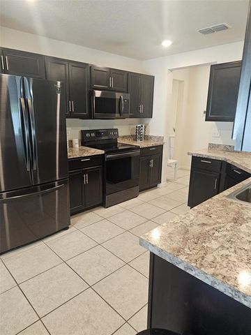 66 ORCHID COURT, Kissimmee, FL 34759