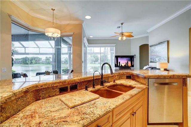 8983 Star Tulip CT, Naples, FL 34113