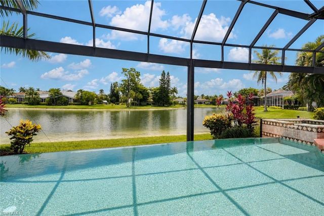 8983 Star Tulip CT, Naples, FL 34113