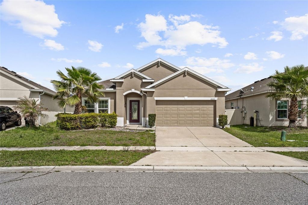 12315 SAWGRASS PRAIRIE LOOP, Orlando, FL 32824