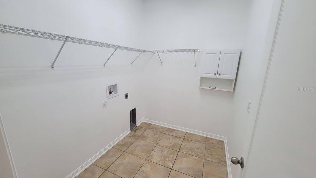 Image 15 of property listing at 12315 SAWGRASS PRAIRIE LOOP, Orlando, FL 32824